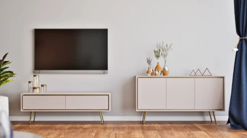 „Nevea“ smėlio spalvos sieninė spintelė – elegantiški svetainės baldai subtilių spalvų, formos be rankenėlių, praturtintos dizainerio braižu